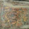 An ancient mural in disrepair on the second floor of the temple.