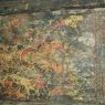 An ancient mural in disrepair on the second floor of the temple.