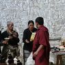 Pilgrims make offerings and request prayers