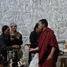 Pilgrims make offerings and request prayers