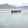 A ferry boat leaving for Samye across the Tsangpo River.