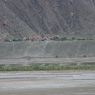 A view of the Yungdrung Ling, a monastery of the Bon religion, across the Tsangpo River.