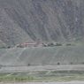 A view of the Yungdrung Ling, a monastery of the Bon religion, across the Tsangpo River.