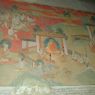 A scene depicting Shakyamuni Buddha and disciples on the walls of the inner circumambulation corridor.