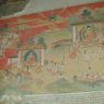 A scene depicting Shakyamuni Buddha and disciples on the walls of the inner circumambulation corridor.