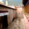 Courtyard outside bKa 'gyur temple, Phur lcog hermitage