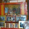 Small altar with various photos of Pha bong kha rin po che