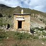 A small structure housing a water-powered mani wheel