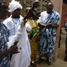 A local fetish priest in Ghana greets visitors at the threshold.