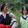 Tibetan women with turquoise hair ornaments.