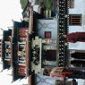 Chinese woman in front of Zangdok Pelri Temple.