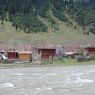 Prayer flags and buildings of Horshul Monastery.