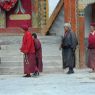 Nuns and a lay woman circumambulating the monastery.