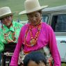 Two Tibetan women wearing multiple necklaces.