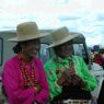 Tibetan women wearing large necklaces.