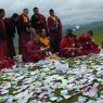 Monks reciting religious texts on top of one of the hills above Larung Gar.