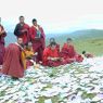 Monks reciting religious texts on top of one of the hills above Larung Gar.