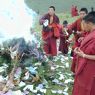 Monks burning juniper branches as offerings to local deities.