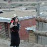 Nomad girls and woman&nbsp;walking along the street.