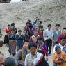 People following behind the car of Khenpo Jikme Phutsok, the founder of the Larung Gar religious community.