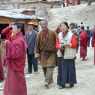 People People following behind the car of Khenpo Jikme Phutsok, the founder of the Larung Gar religious community.