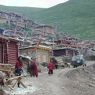 People on the main street of the monastic residences.