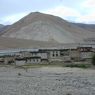 Houses and 'Khor chags dgon pa at front of 'Khor chags village from behind