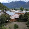 A view from a hill of the government complex in the village of sPyi pa, in Kong po