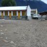 An empty square near government buildings in the village of sPyi pa, in Kong po