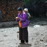 A woman with her baby in the village of sPyi pa, in Kong po