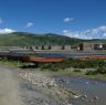 Boats and bridge on river near Lhagang town.&nbsp;