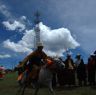 Tibetan man racing horse.&nbsp;