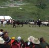 Men competing in horse-related game at the Lhagang Festival.&nbsp;