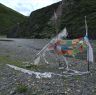 Prayer flags by the river in Lhagang.&nbsp;