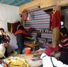 Men and&nbsp;women&nbsp;working at tailor shop.&nbsp;