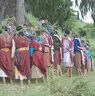 After reaching near the tree they circumumbulates the tree chanting Bro