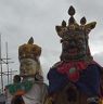 Gonpo and Gonmo standing infront of Guru statue and people gets blessings from there