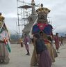 Lady bowing to Gonpo Gonmo to receive  blessing as it is about to set