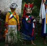 Yamphela and Drangsung among Nubchham standing infront of temple