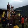 People in line receiving blessings from Nubchham masks