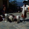 Men at Nangkor praying and bowing