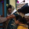 The relative of the bride having tika ceremony