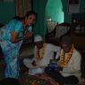 Woman giving gift to her brother