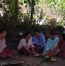 Village women offering prayerd before the ritual