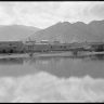 Lhasa during rainy season with Jokhang roof and flooded foreground. Copyright Pitt Rivers Museum, University of Oxford 1998.286.247