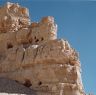 The ledges on the edge of the formation host earthen slab wall remains.