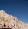 The castle structures and caves.