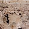 The excavated funerary structure FS5. It is unclear where the large stones in the foreground were originally positioned.