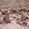 Upright stones probably marking the entrance to a structure on the lower bench.