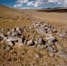 A poorly preserved terraced funerary structure.